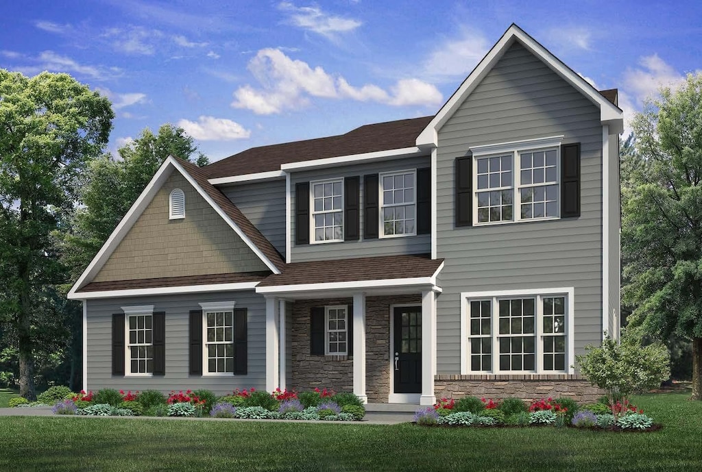 view of front of house featuring stone siding, a front lawn, roof with shingles, and a porch