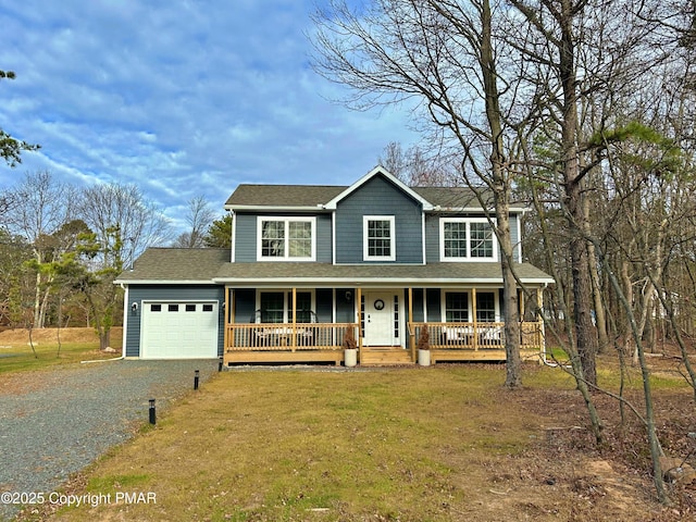 view of front of home with a garage, a porch, roof with shingles, gravel driveway, and a front lawn