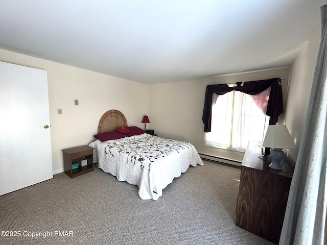 bedroom with carpet flooring and a baseboard heating unit