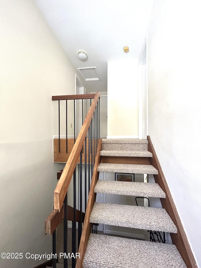 staircase with baseboards