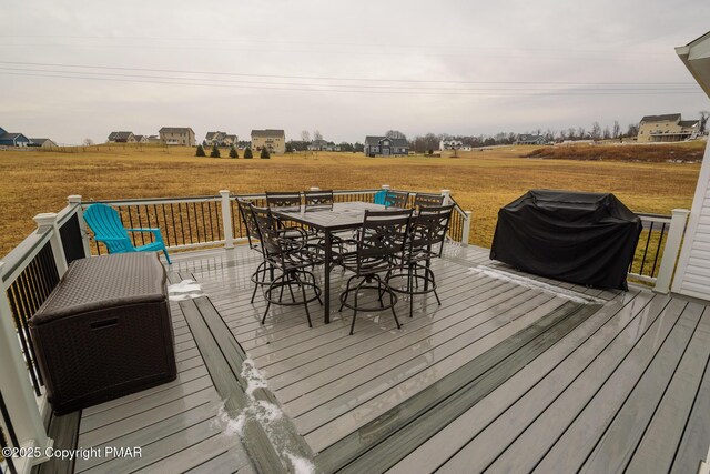 wooden deck with area for grilling