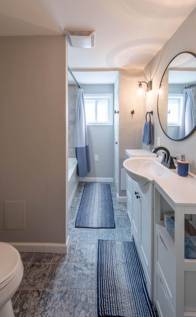115 Squaw Trl, Pocono Lake, PA 18347 - full bath featuring vanity, shower / bath combo with shower curtain, and tile patterned flooring