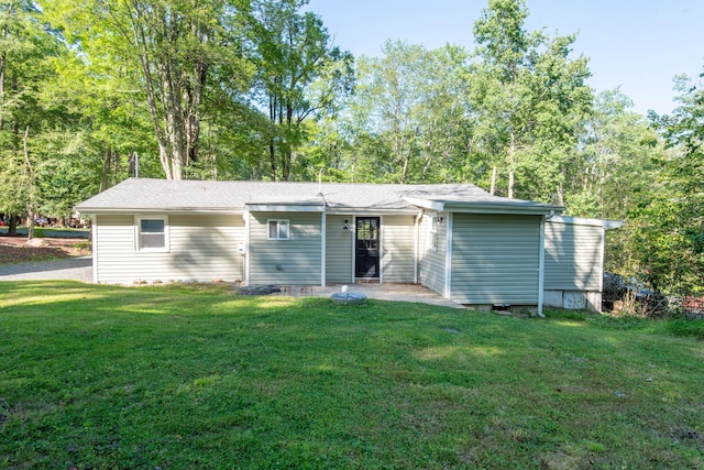 115 Squaw Trl, Pocono Lake, PA 18347 - back of property featuring a yard