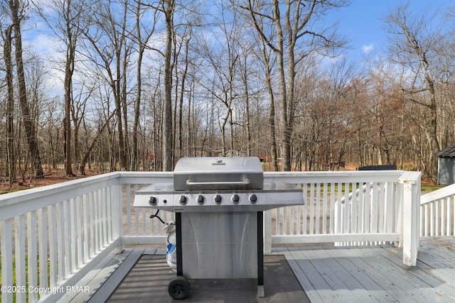 wooden terrace with grilling area