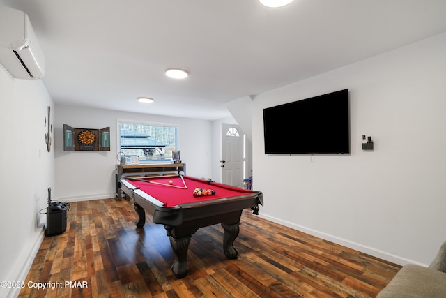 playroom featuring a wall mounted air conditioner, dark hardwood / wood-style flooring, and billiards