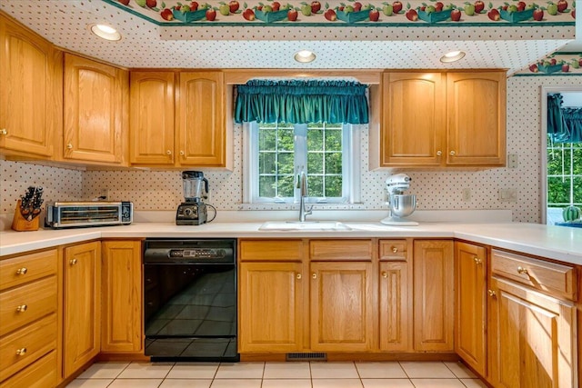 1319 Poulos Ct, Stroudsburg, PA 18360 - kitchen featuring black dishwasher, light countertops, decorative backsplash, and light tile patterned flooring