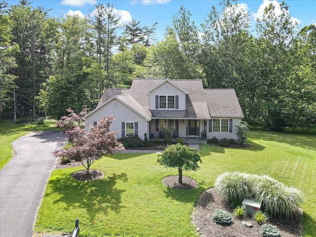 1319 Poulos Ct, Stroudsburg, PA 18360 - view of front of house with covered porch, asphalt driveway, and a front yard