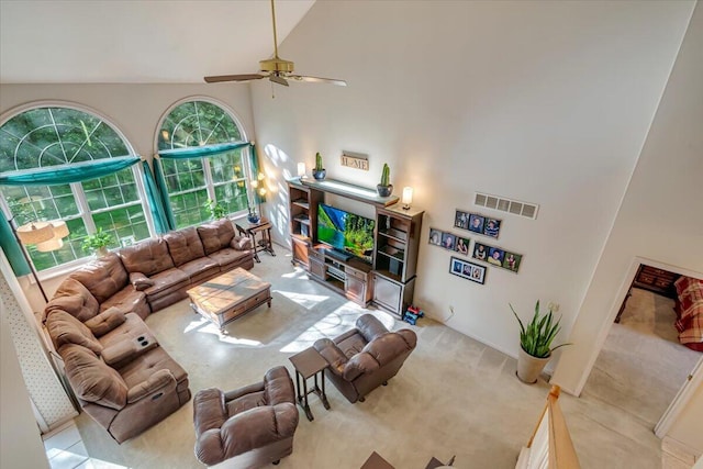 1319 Poulos Ct, Stroudsburg, PA 18360 - carpeted living area featuring high vaulted ceiling and ceiling fan
