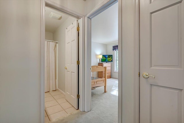 1319 Poulos Ct, Stroudsburg, PA 18360 - corridor featuring light carpet and light tile patterned flooring