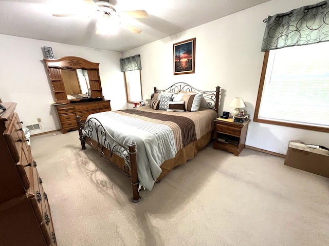 2291 Mountain Rd, Stroudsburg, PA 18360 - bedroom featuring light carpet, a ceiling fan, and baseboards