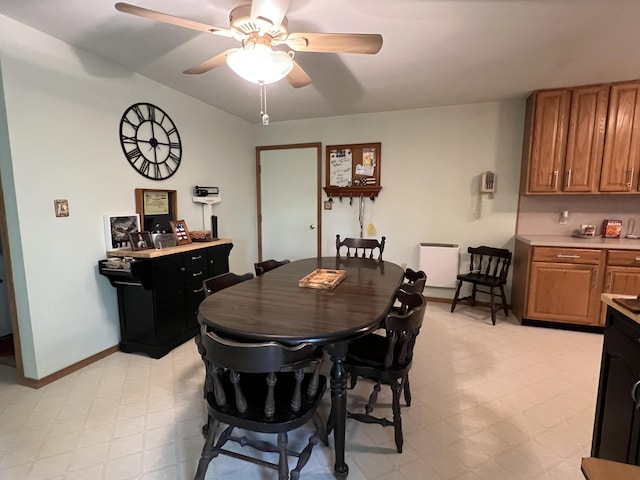 2291 Mountain Rd, Stroudsburg, PA 18360 - dining space featuring light floors, baseboards, and a ceiling fan