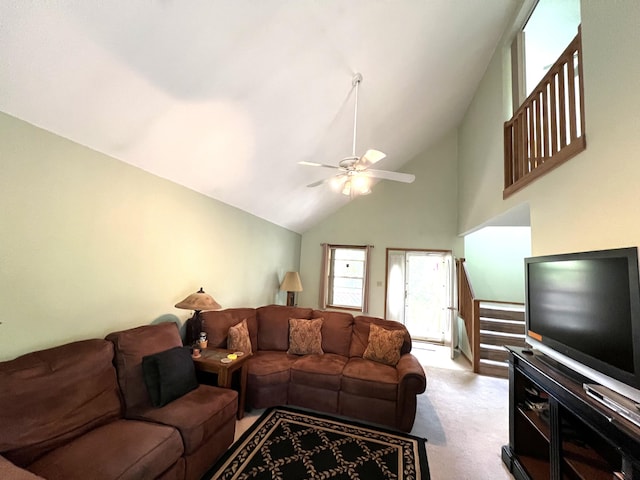 2291 Mountain Rd, Stroudsburg, PA 18360 - living room with light carpet, high vaulted ceiling, ceiling fan, and stairs
