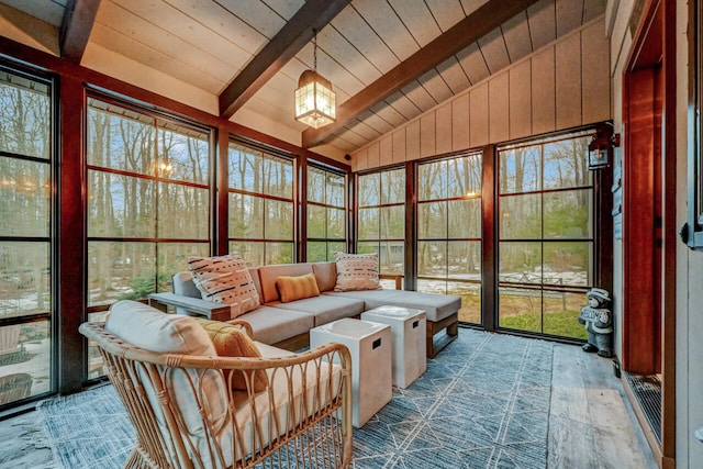 sunroom with vaulted ceiling with beams and wooden ceiling