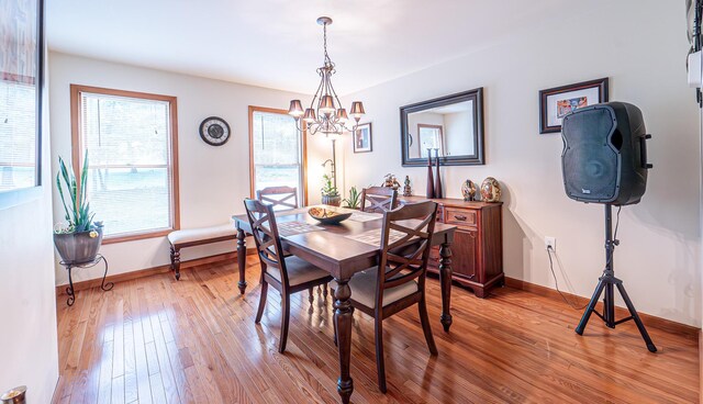 1154 Park Dr, East Stroudsburg, PA 18302 - dining space with a chandelier, healthy amount of natural light, and light wood finished floors