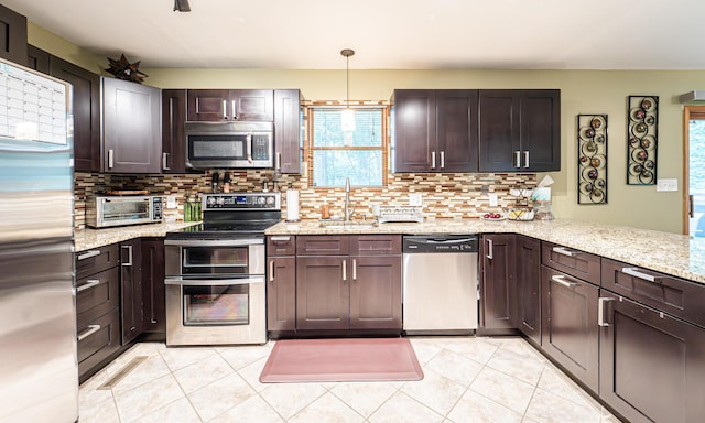 1154 Park Dr, East Stroudsburg, PA 18302 - kitchen featuring stainless steel appliances, backsplash, and light tile patterned floors