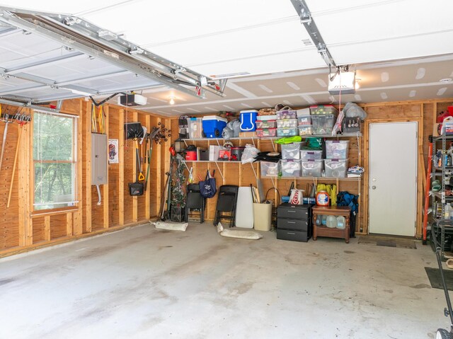 1154 Park Dr, East Stroudsburg, PA 18302 - garage with electric panel and a garage door opener