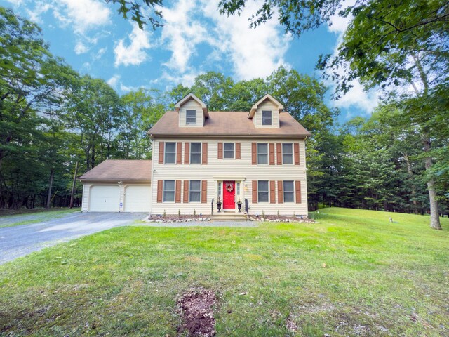 1154 Park Dr, East Stroudsburg, PA 18302 - colonial house with asphalt driveway, a front yard, and entry steps