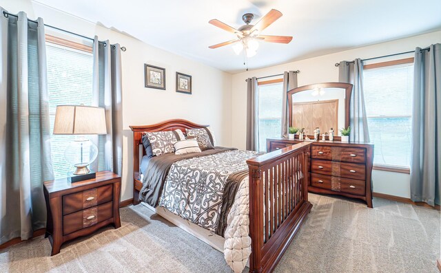 1154 Park Dr, East Stroudsburg, PA 18302 - bedroom featuring multiple windows, carpet flooring, and a ceiling fan