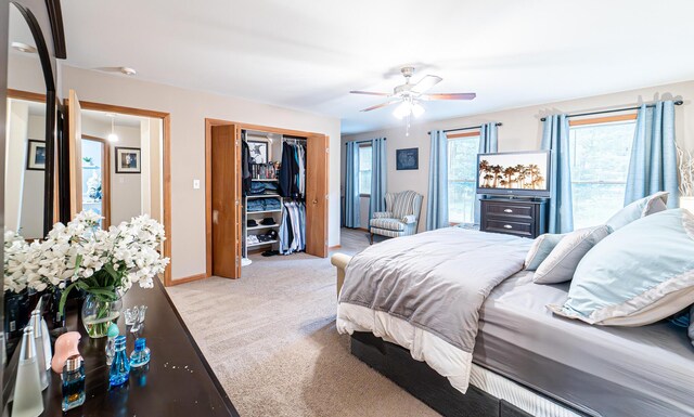 1154 Park Dr, East Stroudsburg, PA 18302 - bedroom with light carpet, a closet, and ceiling fan