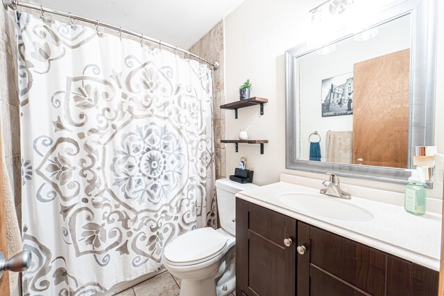 1154 Park Dr, East Stroudsburg, PA 18302 - full bath with vanity, tile patterned floors, and curtained shower