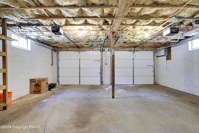 garage featuring a garage door opener