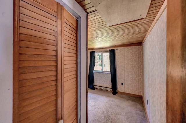 209 Cross St, Pocono Lake, PA 18347 - hall with wooden ceiling, carpet floors, a baseboard heating unit, and baseboards