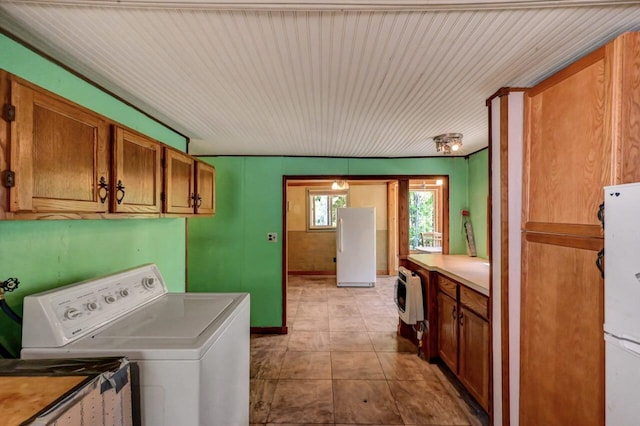 209 Cross St, Pocono Lake, PA 18347 - laundry area featuring washer / dryer and cabinet space