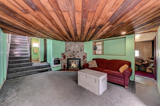 209 Cross St, Pocono Lake, PA 18347 - living room with heating unit, stairway, a stone fireplace, and wooden ceiling