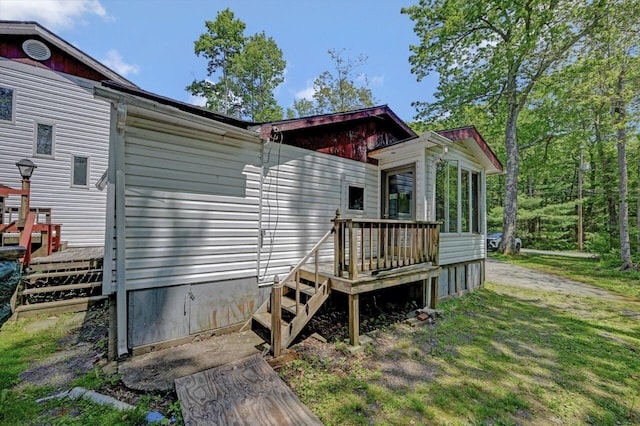 209 Cross St, Pocono Lake, PA 18347 - view of property exterior with a wooden deck