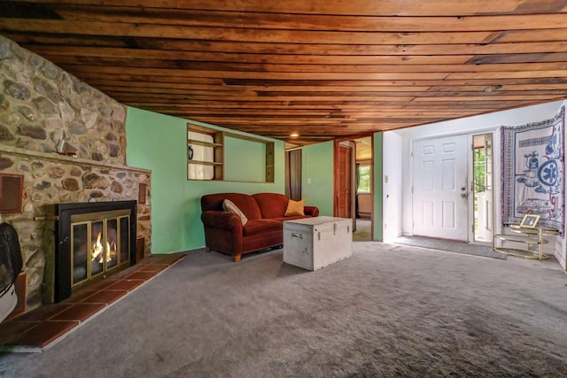 209 Cross St, Pocono Lake, PA 18347 - living room with wooden ceiling, carpet floors, and a stone fireplace