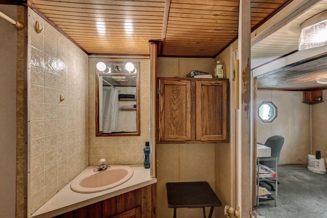 209 Cross St, Pocono Lake, PA 18347 - bathroom with wooden ceiling, tile walls, and vanity
