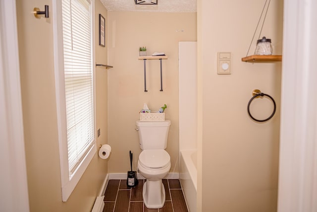 2735 Rte 390, Canadensis, PA 18325 - full bathroom featuring toilet and baseboards