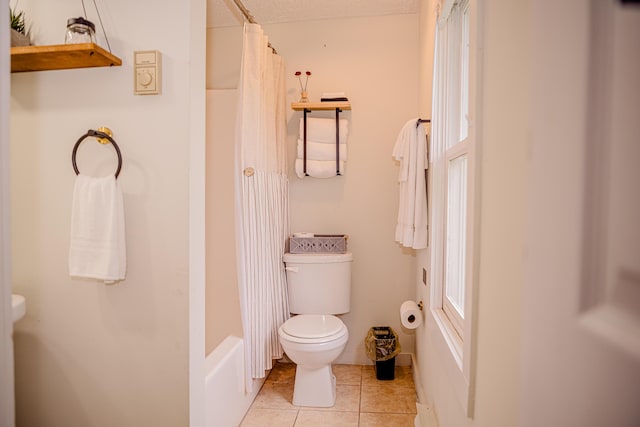 2735 Rte 390, Canadensis, PA 18325 - bathroom with toilet, tile patterned flooring, shower / tub combo with curtain, and a textured ceiling