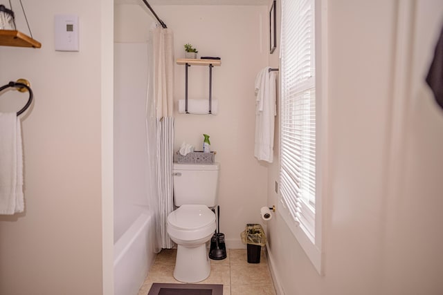 2735 Rte 390, Canadensis, PA 18325 - bathroom with toilet, plenty of natural light, tile patterned flooring, and shower / tub combo with curtain