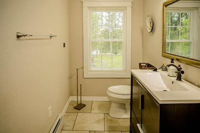 2735 Rte 390, Canadensis, PA 18325 - bathroom featuring vanity, toilet, tile patterned flooring, and healthy amount of natural light