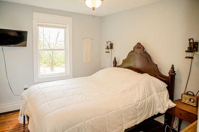 2735 Rte 390, Canadensis, PA 18325 - bedroom featuring dark wood-style flooring, a baseboard heating unit, and baseboards