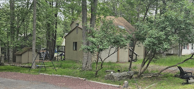 8934 Deerfield Rd, Tobyhanna, PA 18466 - view of home's exterior with a storage shed