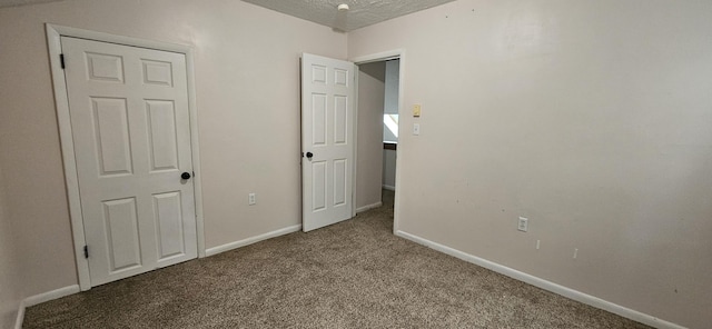 8934 Deerfield Rd, Tobyhanna, PA 18466 - unfurnished bedroom with carpet floors and a textured ceiling
