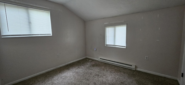 8934 Deerfield Rd, Tobyhanna, PA 18466 - carpeted spare room with a baseboard radiator and lofted ceiling