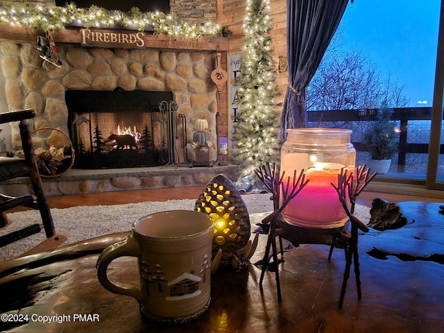 view of patio featuring an outdoor stone fireplace