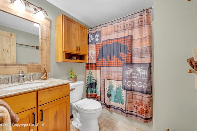 full bath with shower / bath combination with curtain, vanity, toilet, and tile patterned floors