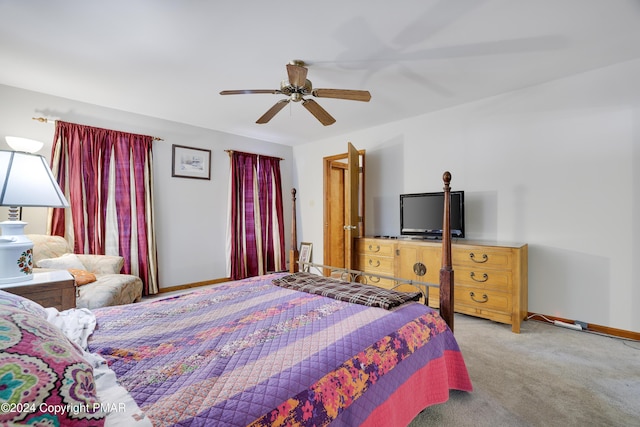 bedroom featuring carpet, baseboards, and ceiling fan