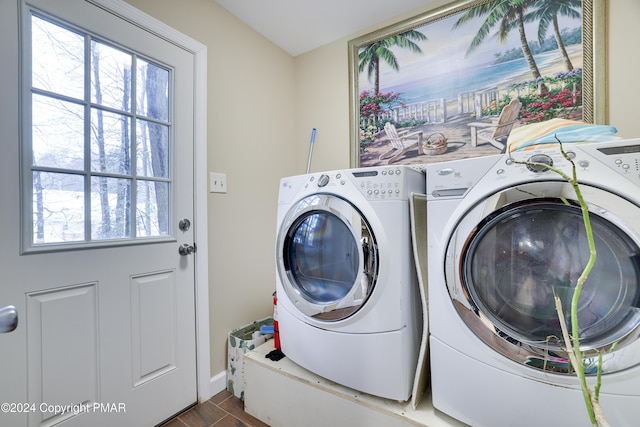 laundry room with washing machine and dryer and laundry area