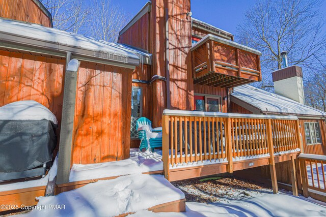 exterior space with a balcony and a deck