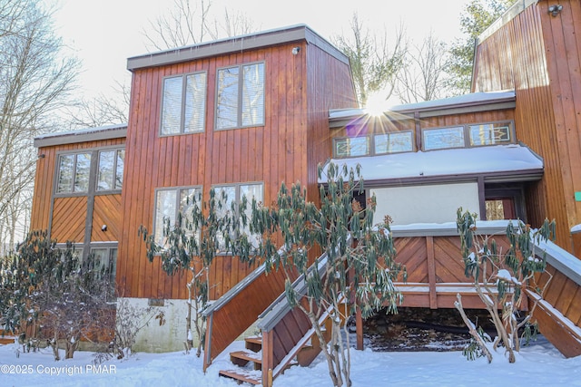 view of snow covered property