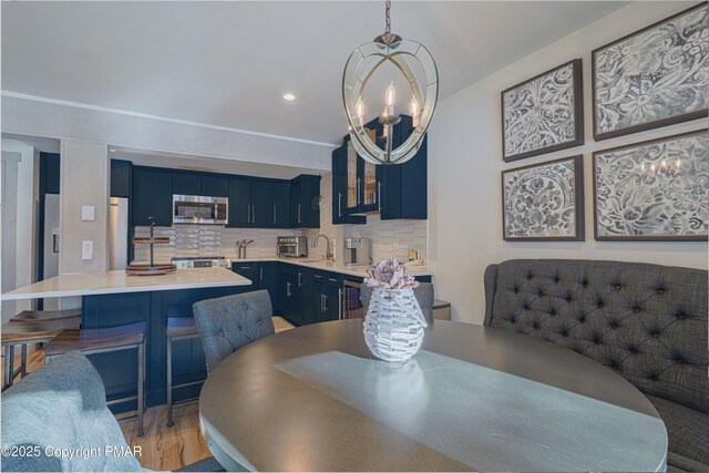 dining space featuring a chandelier