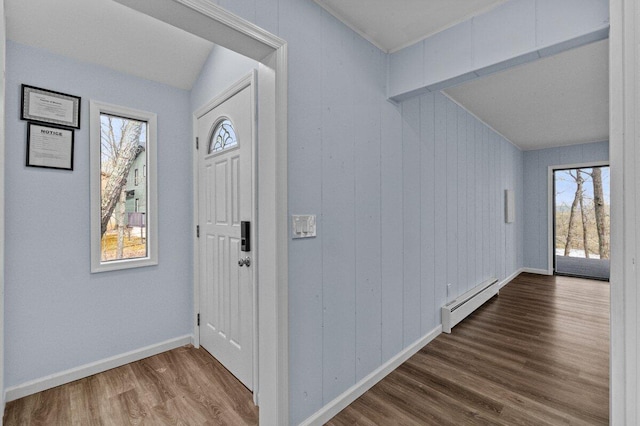 2094 Scarborough Way, Bushkill, PA 18324 - entryway featuring wood finished floors, baseboards, a baseboard heating unit, and a healthy amount of sunlight