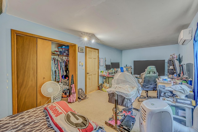 6163 Somers Ter, Tobyhanna, PA 18466 - carpeted bedroom featuring an AC wall unit, a closet, and a desk