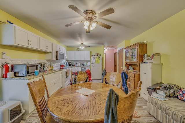 6163 Somers Ter, Tobyhanna, PA 18466 - dining area with ceiling fan and light wood-style flooring