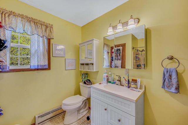 6163 Somers Ter, Tobyhanna, PA 18466 - full bathroom featuring baseboard heating, toilet, vanity, and tile patterned flooring